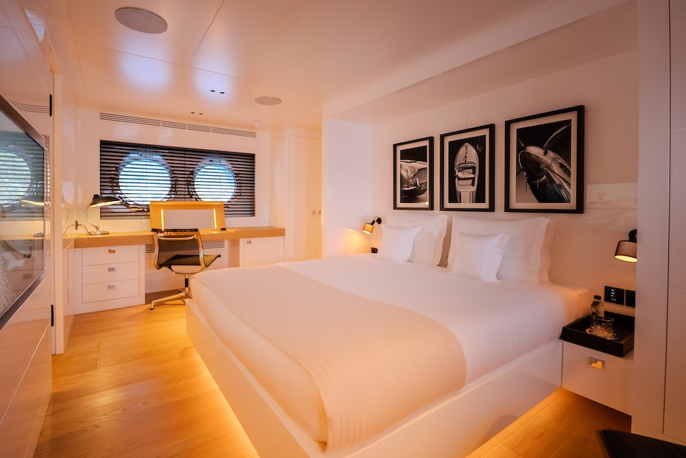 Master cabin on CARMEN yacht with natural light and spacious layout