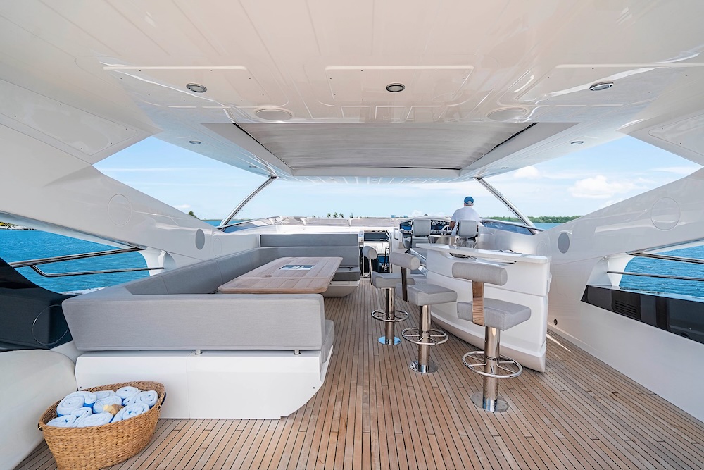 Bridge deck on Quantum yacht with helm station and relaxed lounge seating