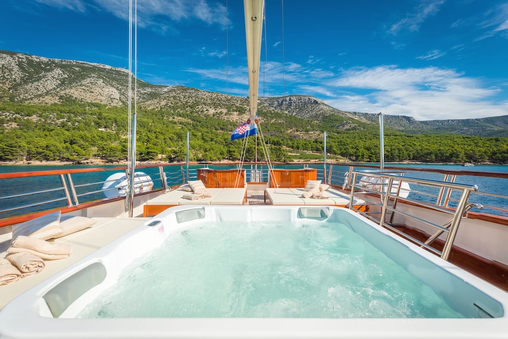 Jacuzzi on Son de Mar sundeck overlooking the Adriatic coastline