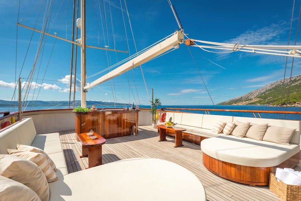 Sun deck lounge area on Son de Mar with open sea views