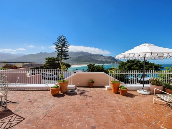 Villa Issima Hillside House terrace overlooking the Atlantic coastline in Cape Town