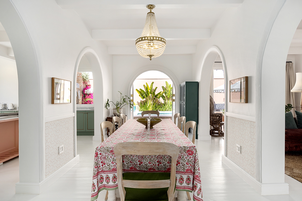 Dining room at Villa Issima Hillside House opening onto the pool terrace in Cape Town