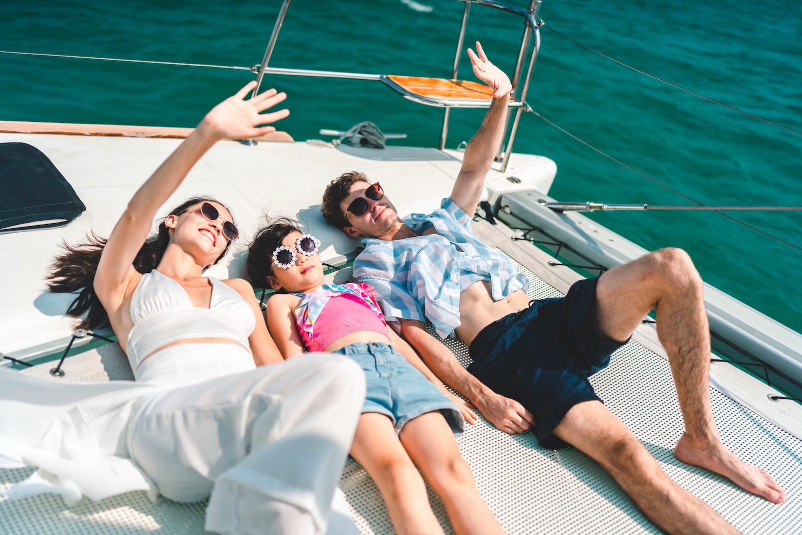 Family relaxing together aboard a yacht on the Adriatic Sea