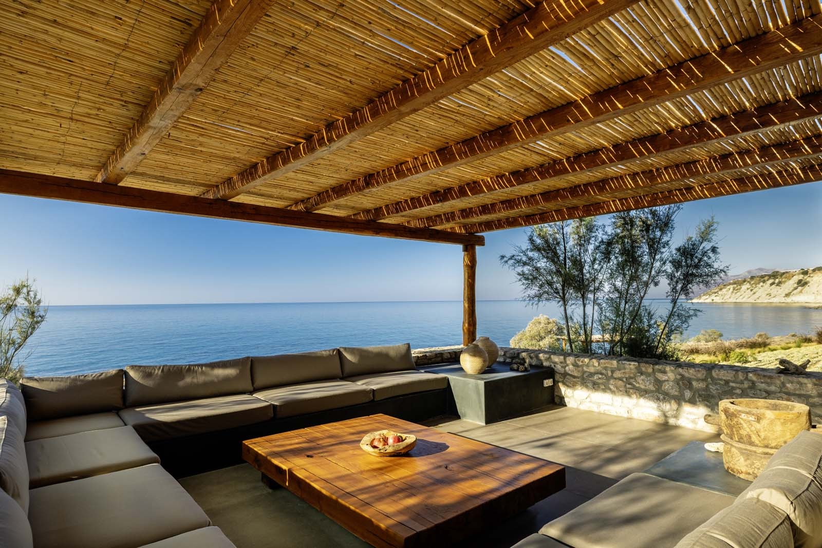 Private outdoor lounge space at a secluded beachfront estate in Crete, Greece