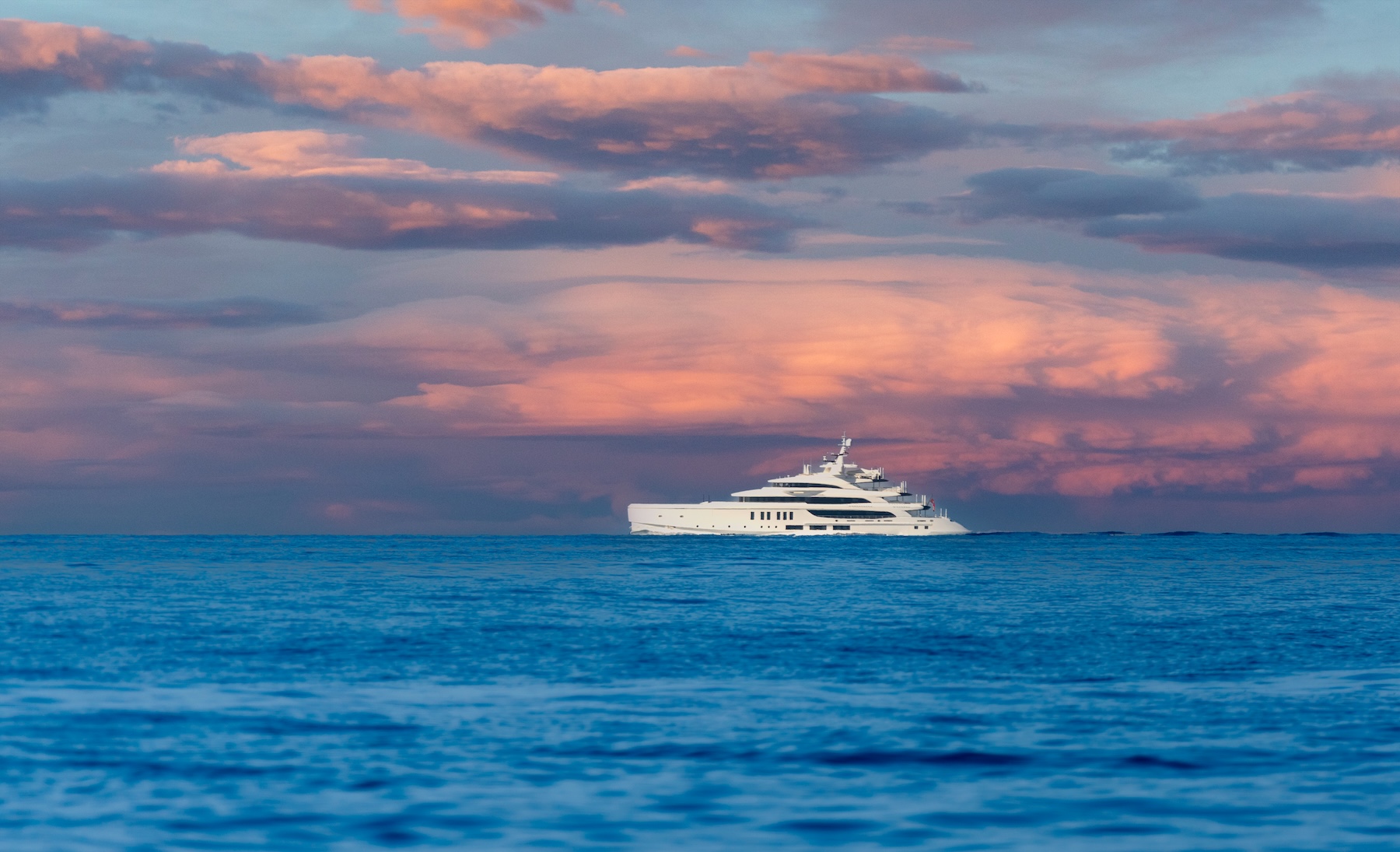 Private yacht at sea during a calm sunset across the Adriatic Sea