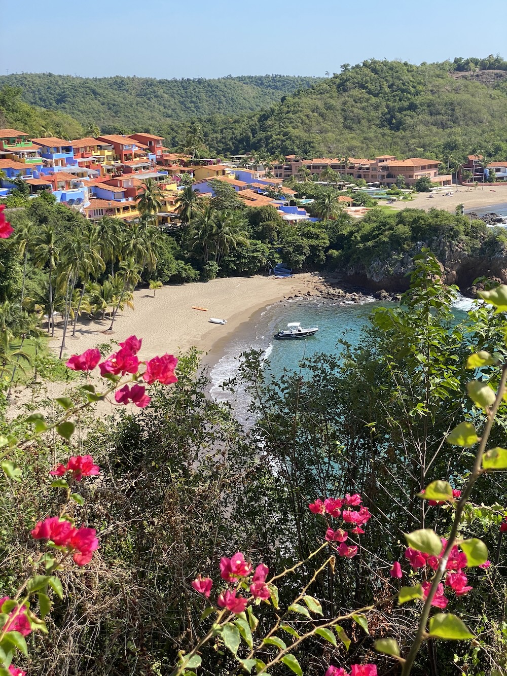Colourful hillside homes overlooking the beach and Pacific Ocean in Careyes, Mexico.