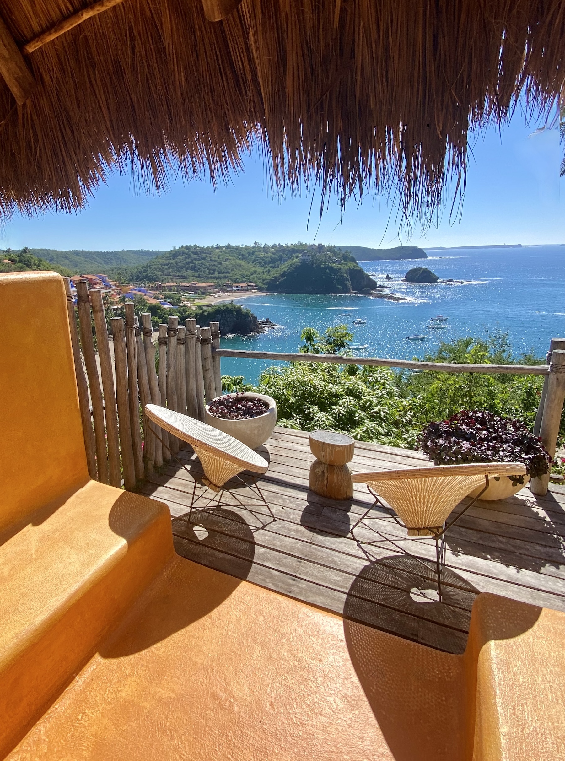 Private suite terrace at Casa Torre overlooking the Pacific Ocean and coastline of Careyes, Mexico.