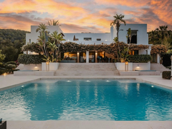 El Zafiro Ibiza villa with a private swimming pool, spacious terrace, and landscaped gardens at dusk